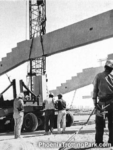 Moving cantilever beams during construction